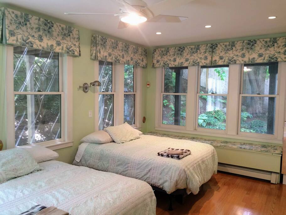 Master bedroom - 2 double beds, blackout shades under the valances