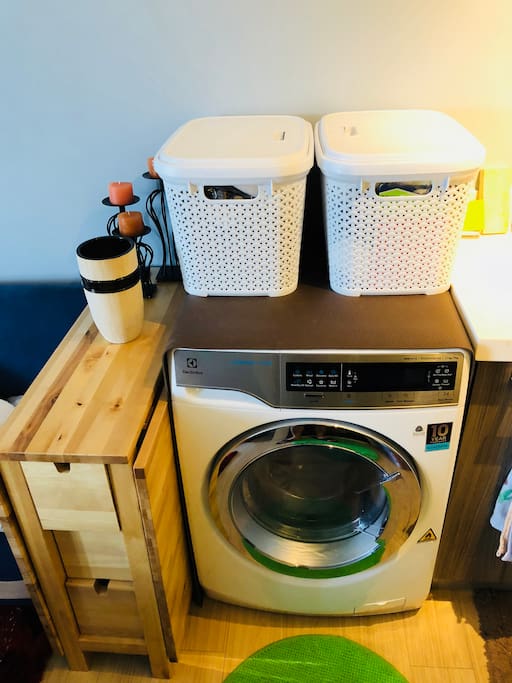 Washer and Dryer machine side by side with extendable table that can seat 4 people.