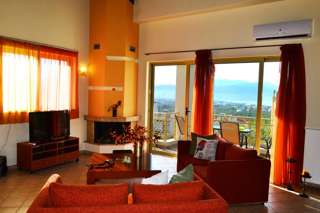 The spacious living room. Our villas are nicely furnished.