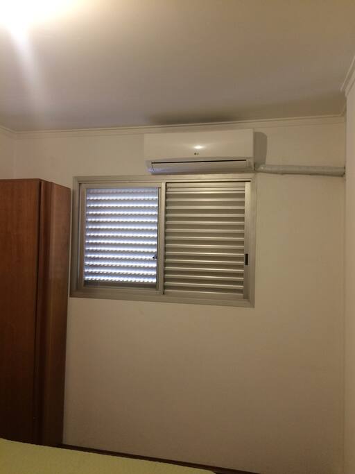 Quarto com ar condicionado