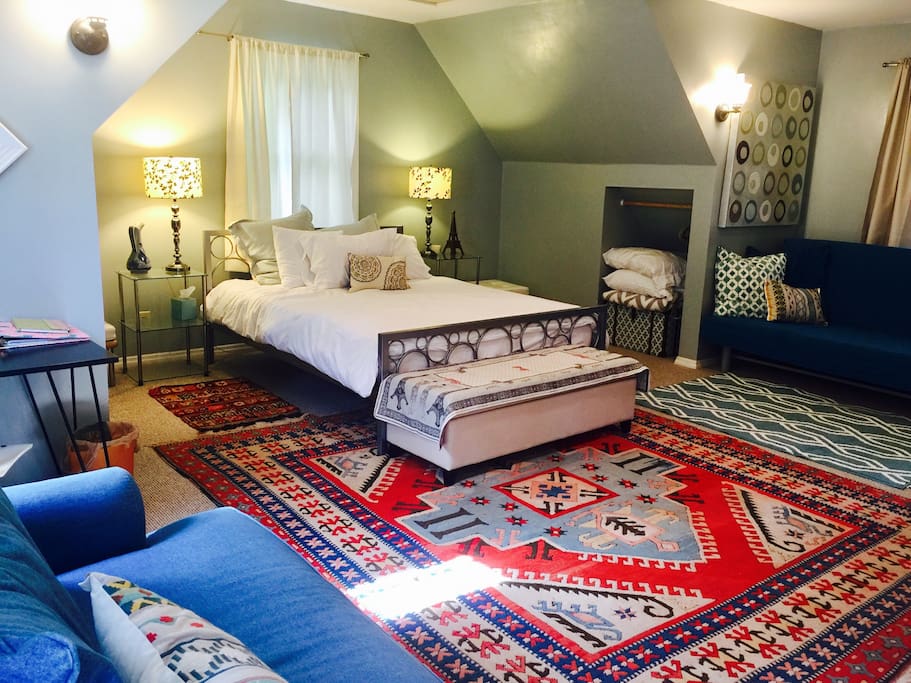 The queen bed is a firm foam mattress. There is a Queen futon and twin convertible as well. It is amazing how large this small space is above my garage.