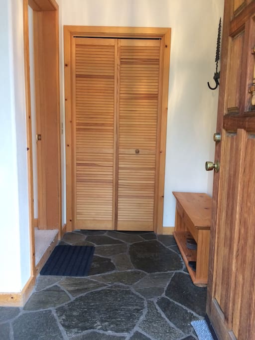 Entry with closet for guests