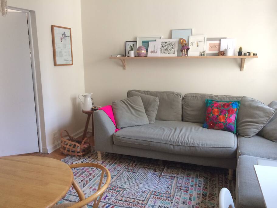 Comfy couch right outside of bedroom