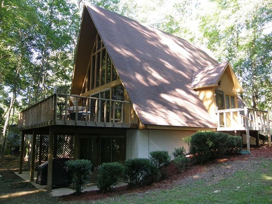 Unusually large for a midcentury a-frame, our home offers 3 floors of living & leisure space nestled on a 1-acre wooded lot.