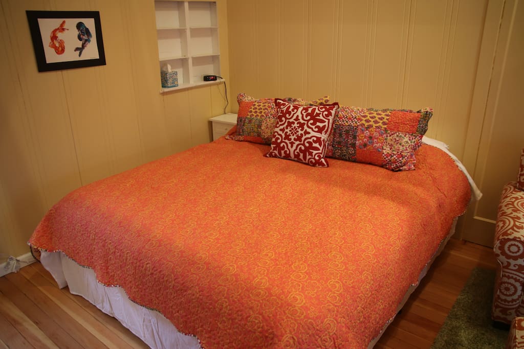 The luxurious California king bed.