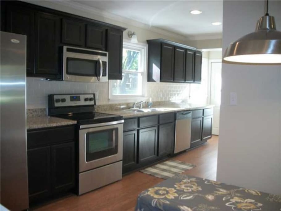 Kitchen includes refrigerator, oven, stove, microwave, blender (margaritas!), coffee maker, and dishwasher.