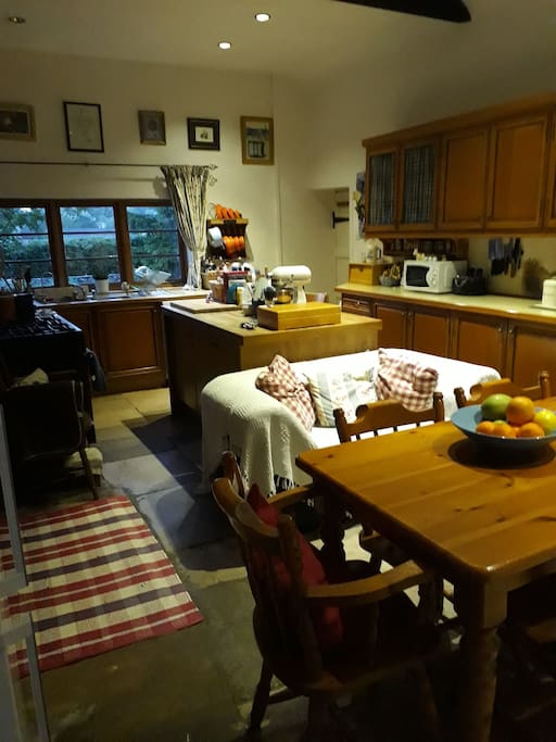 Kitchen where a simple breakfast is laid out for guests to help themselves.