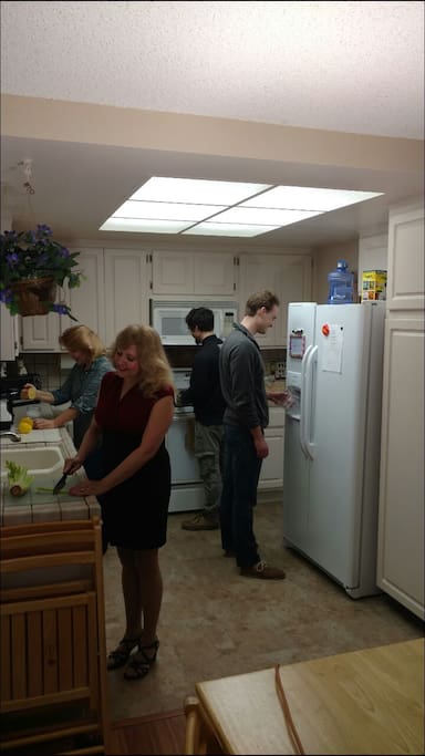 Happy community living in kitchen (permission from people to use photos).