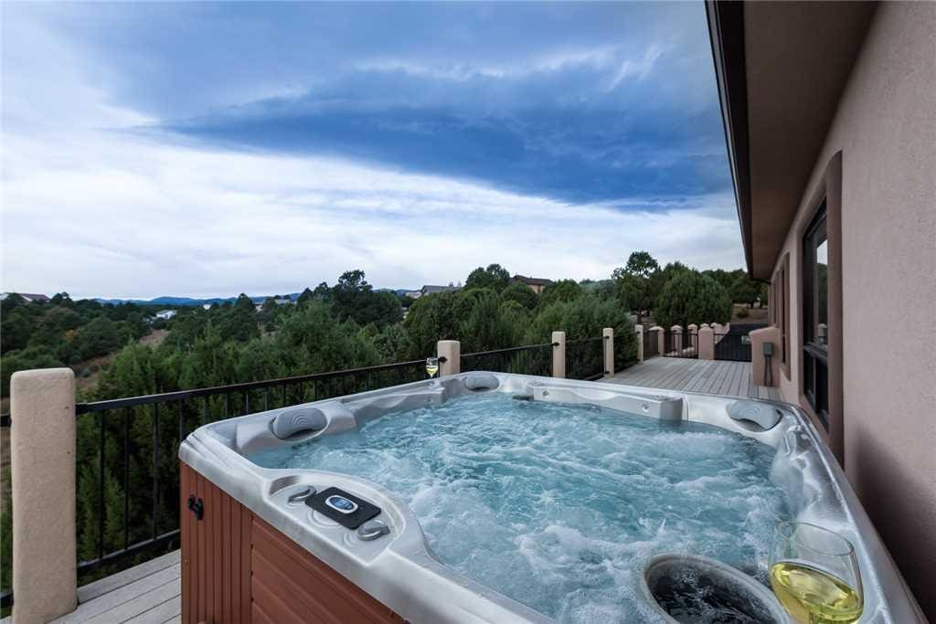 Soothing Waters - Imagine ending each day in the hot tub while you celebrate another perfect day on your vacation. After a long e