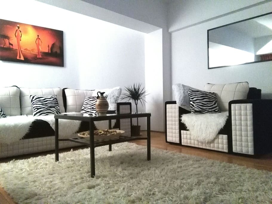 Cozy living room , decorated in African style , with carefully chosen decorative details, for a pleasant stay