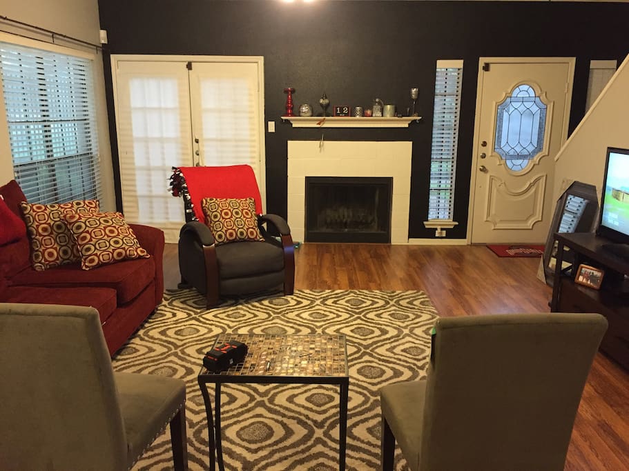 Living room with extra large couch and space for air mattress