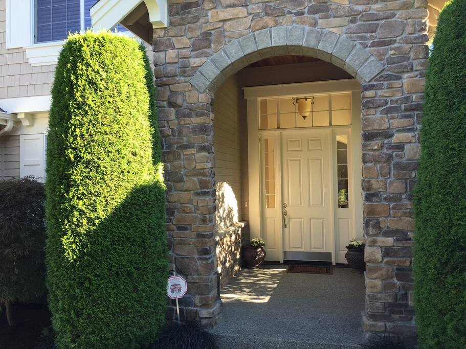 Front entrance into home. Garage available for parking one vehicle