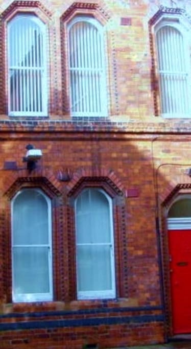 The apartment is in a beautiful Victorian building with original windows and doors. It was built in 1869.