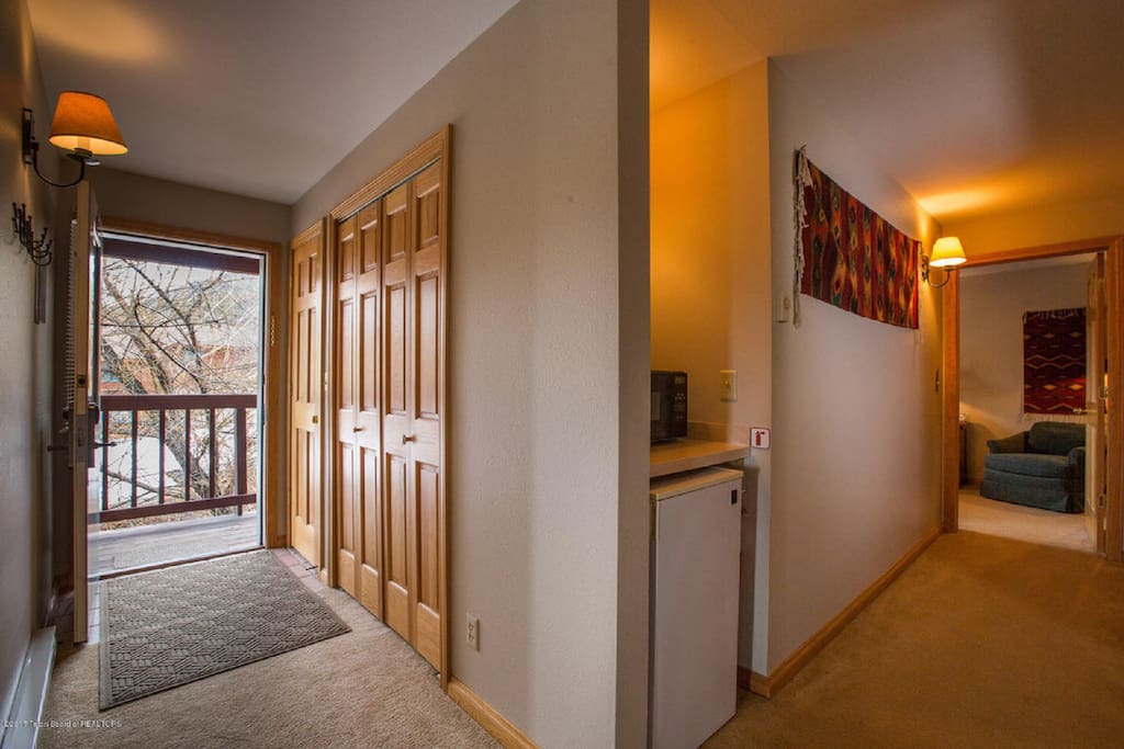 Unit B private access into the second story with 2 bedrooms, 2 full bathrooms, washer/dryer, and deck unit.