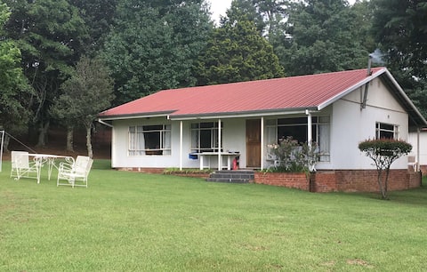 Picturesque mountain farmhouse with a cozy feel