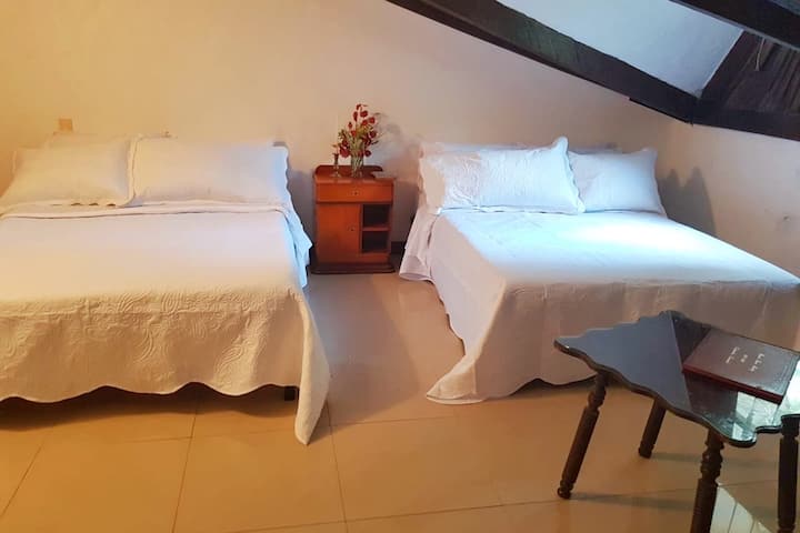 Alcoba # 4 in the loft of the house, with bathroom and closet,  terrace to the Las Ceibas courtyard.