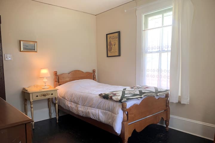 Bedroom 5 with single bed, at the back of the house.