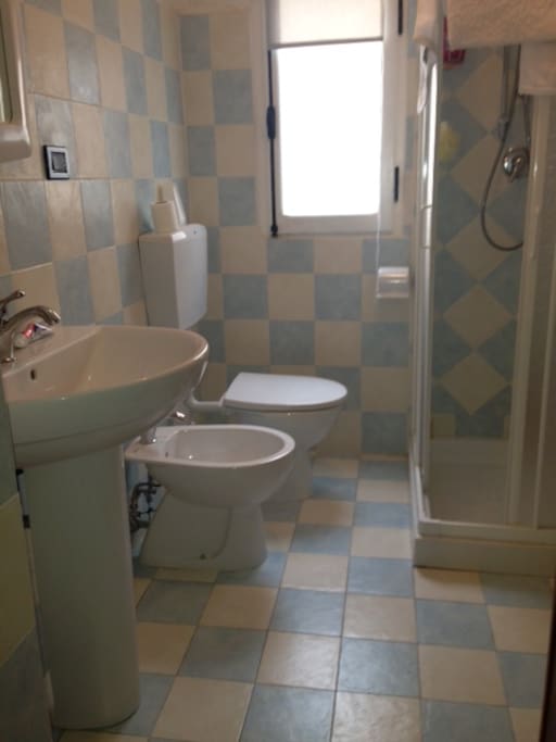 Bathroom with heated towel rail and excellent water pressure shower. Instant hot water by new combi gas boiler.