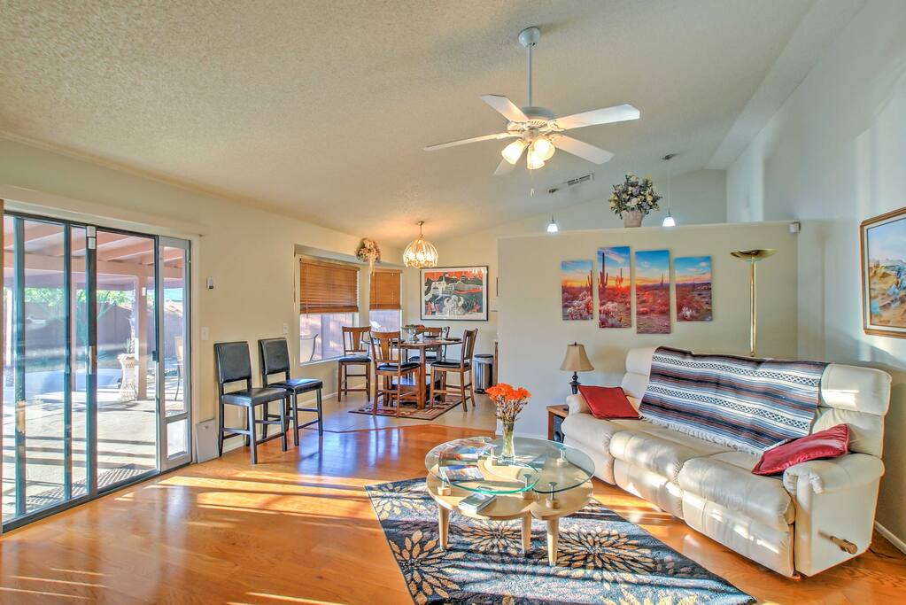 Relax in the living room while admiring the beautiful backyard through the sliding glass doors.