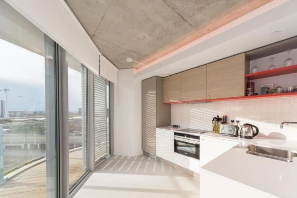 Bright kitchen with balcony