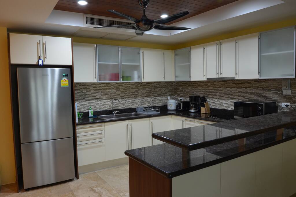 Fully equipped kitchen. Large refrig. Micro, toaster, rice cooker, coffee maker, utensils. Bright LED lighting, remote controlled ceiling fan and thermostatically controlled AC.
