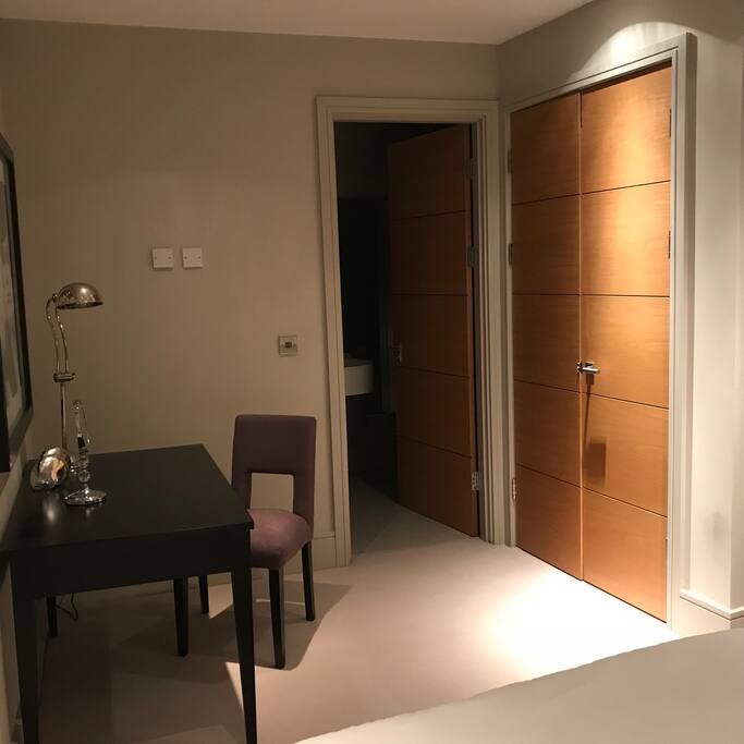 Dressing table, built in wardrobe and bathroom entrance