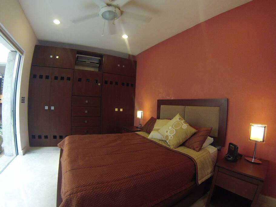 Downstairs bedroom with queen size bed and plenty of closet space