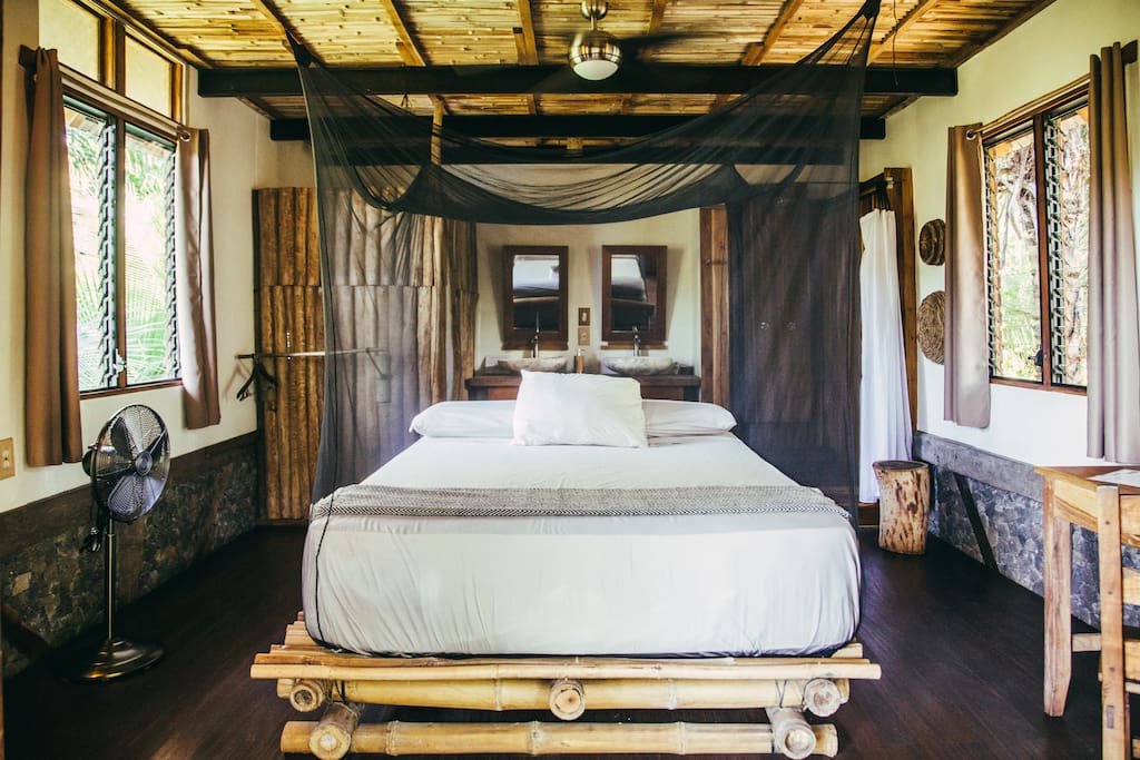 The master bedroom, decorated with local crafts and materials