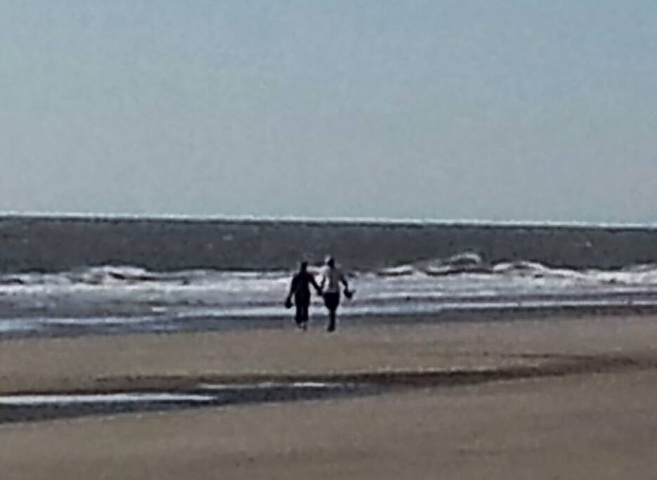 Walking on the beach in front of the Sonesta Resort.