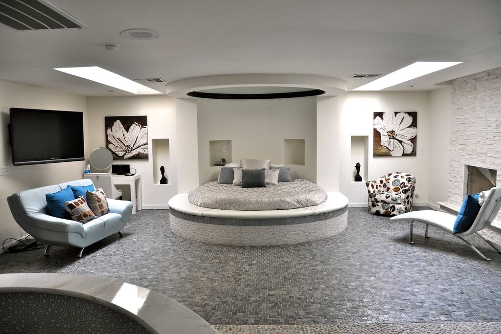 Master Bedroom with Circle Bed & Mirror on the ceiling