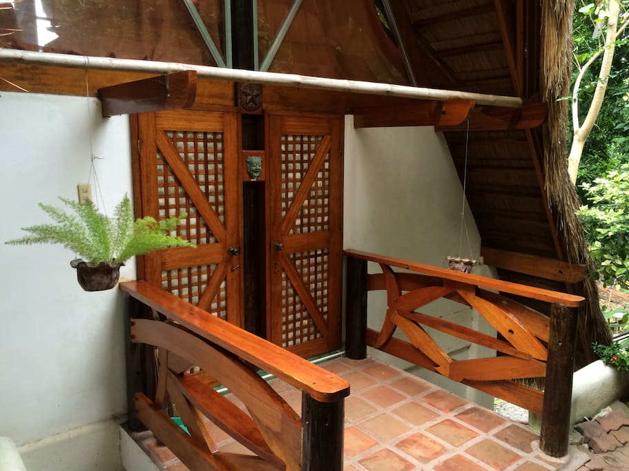 Tropical entrance to this special home away from home.
