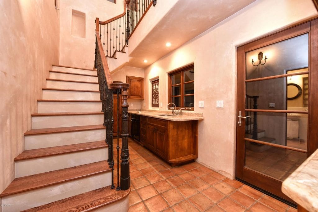 kitchen and stairs to the upstairs bedroom