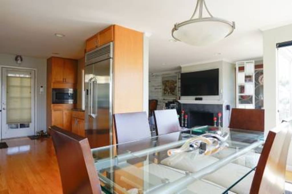 Dining room has sweeping, dramatic views from Twin Peaks down to Eureka Valley down to the Bay