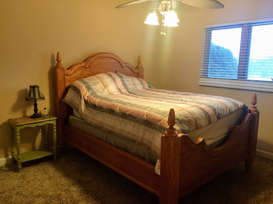 Private Bedroom overlooks pool and driveway.