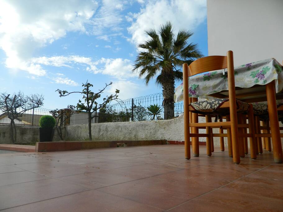 Veranda con giardino