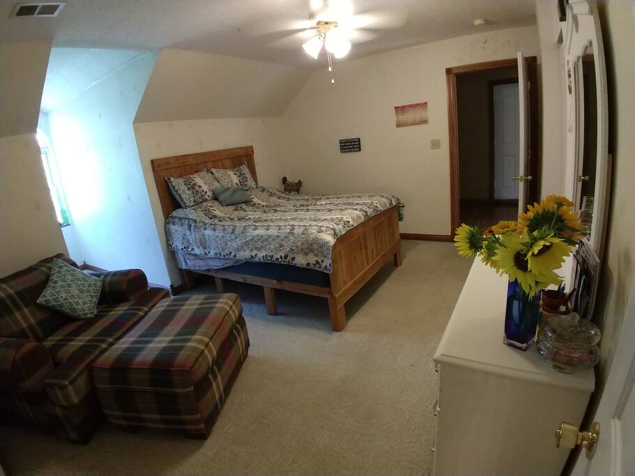 The main bedroom, with attached private bathroom located on your private second floor.