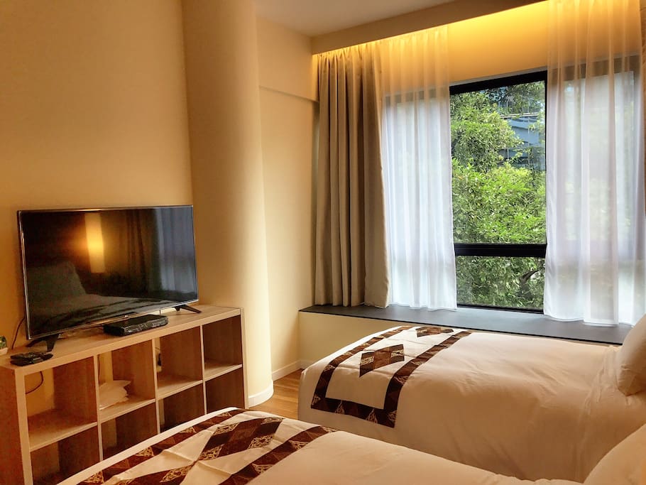 The Twin Room (private) with 49" LG LED Smart TV, satellite channels, and free wi-fi.