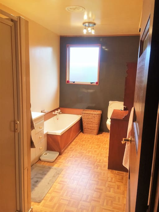 shared bathroom with separate shower