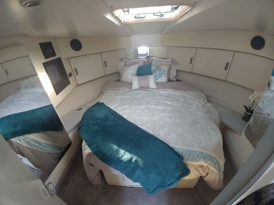 Queen bed with memory foam mattress. Relax while you watch the 2nd smart TV.