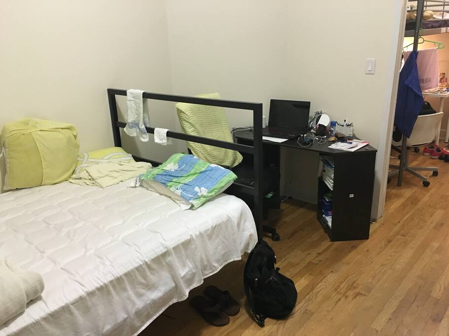 a large desk for laptop and documents