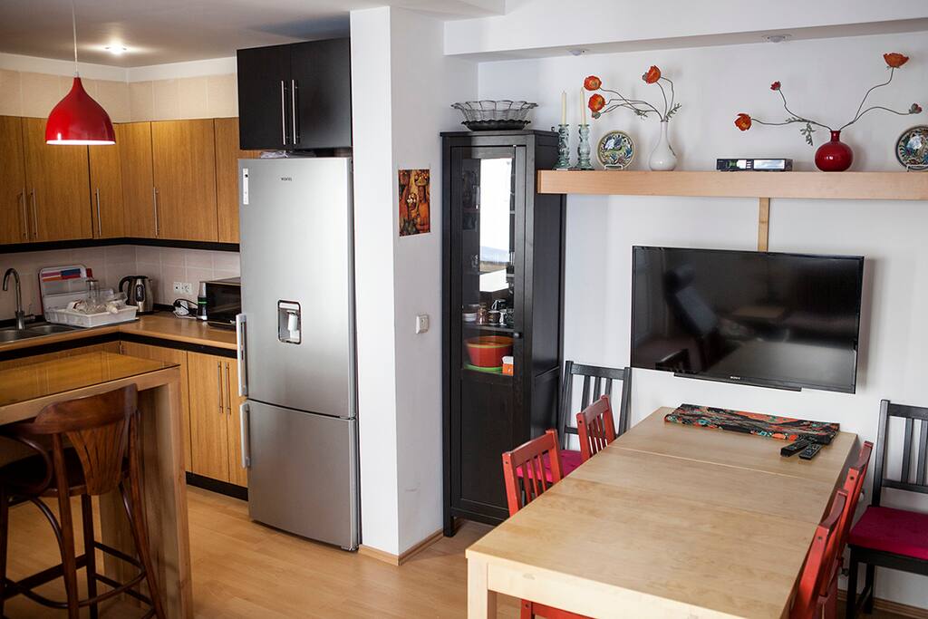 Kitchen plus same dining room table. You have Wifi and TV.