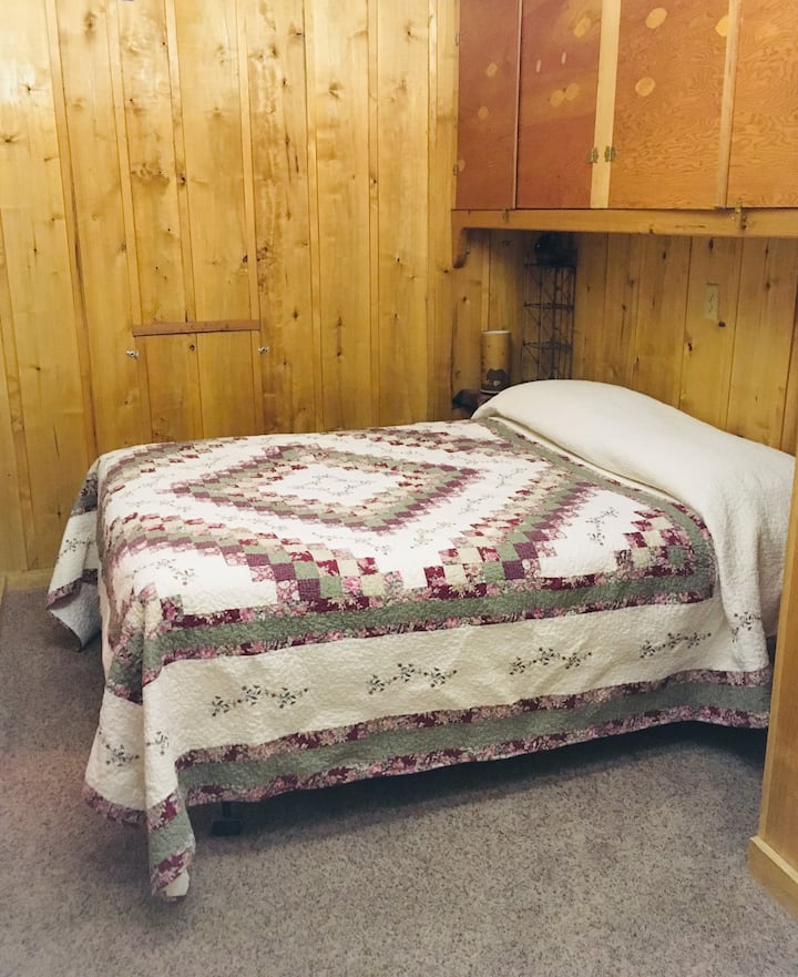 main floor bedroom with full bed