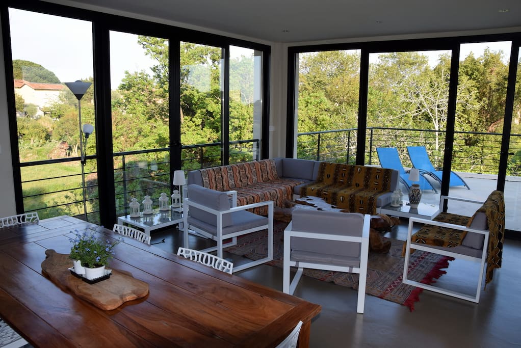 Main living space opens on terrace