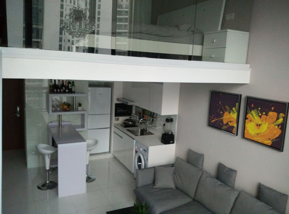The high ceiling makes the apartment feel bigger, but it's quite compact.