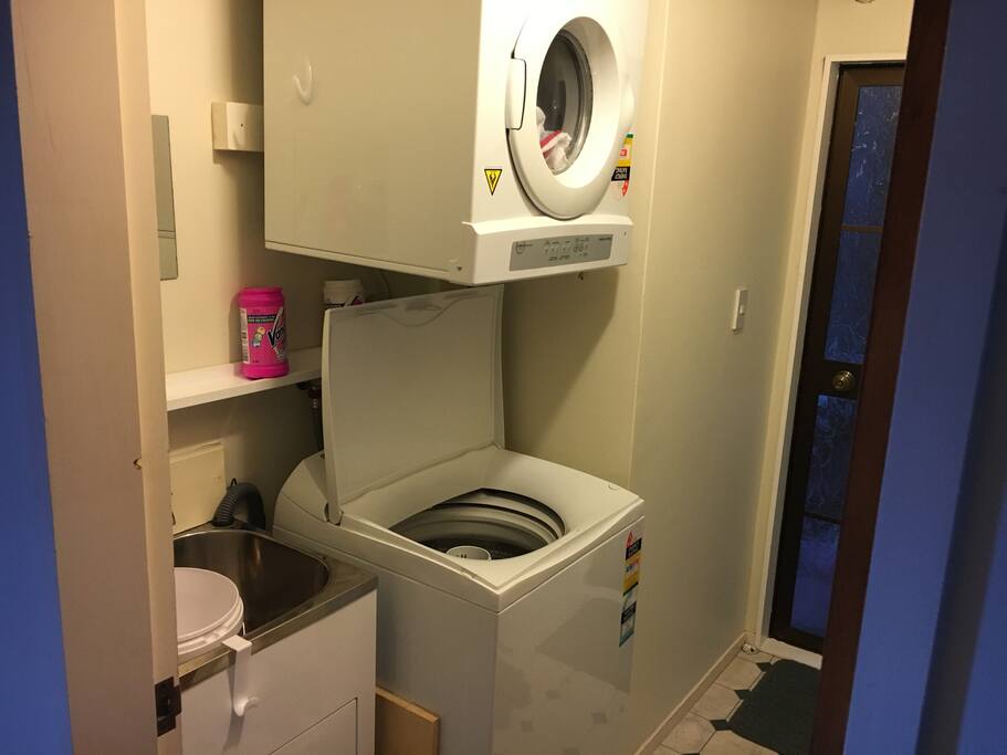 Laundry: washer/dryer/sink. Back door access to garden.