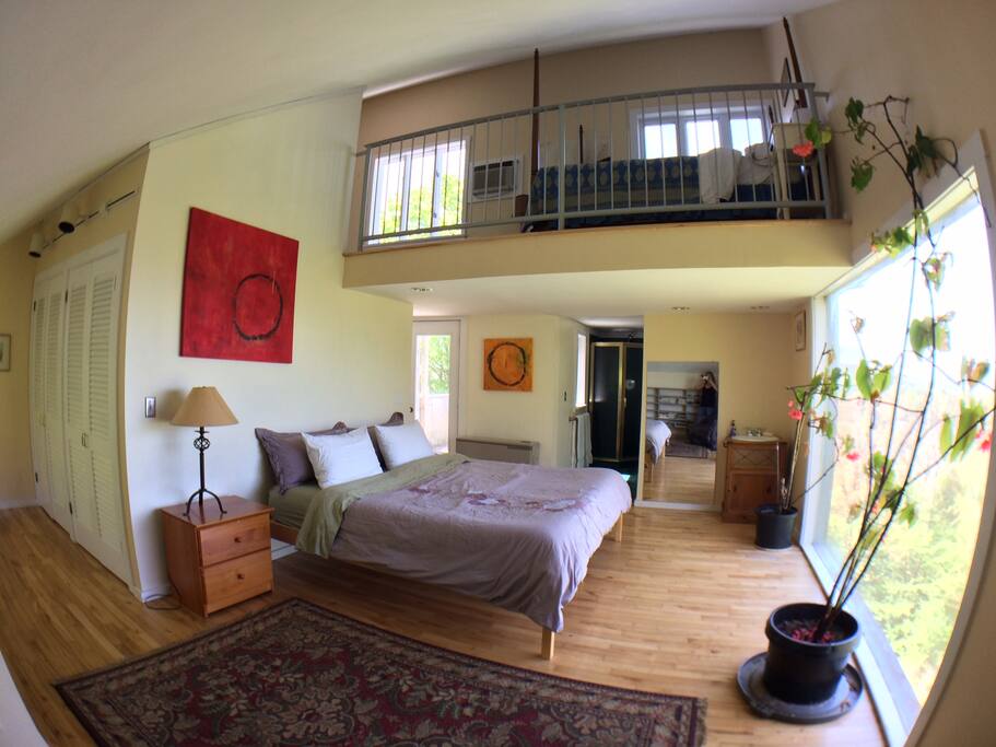 master bedroom with balcony & loft with spectacular views