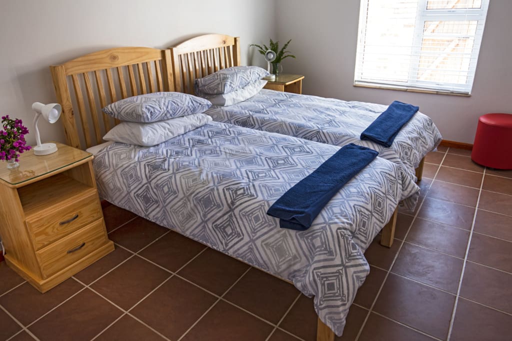 The two beds in the bedroom.