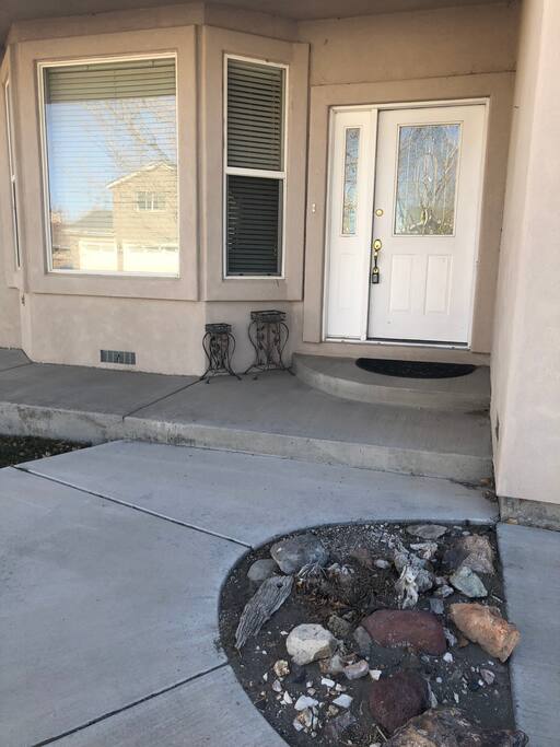 There is a couple steps to get to the front door.