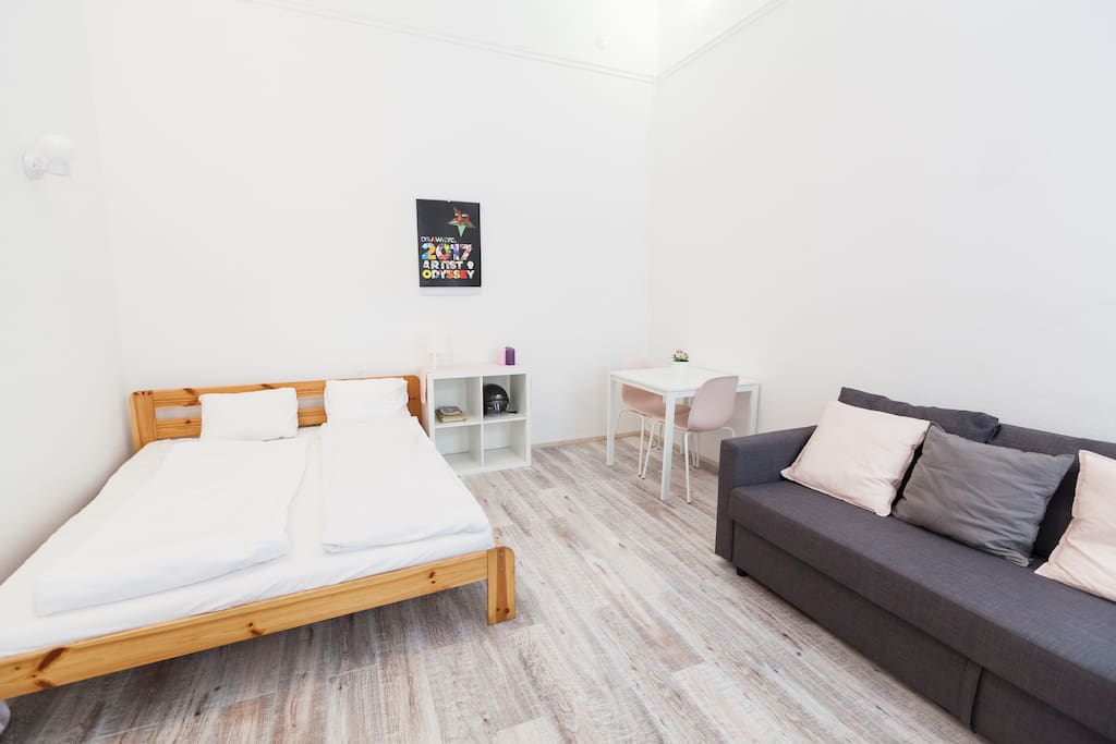 Bedroom with a king size bed and a sofa bed