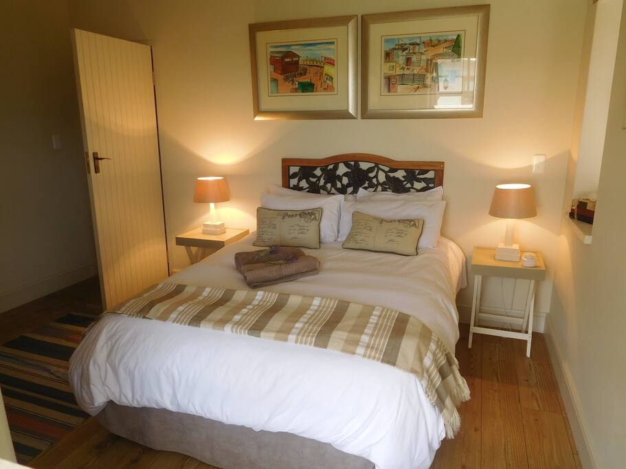 Main room with double bed.